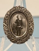 (image for) Vintage oval framed print of boy in Little Lord Fauntleroy type clothing