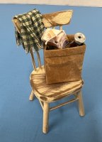 (image for) Shabby chic chair with bag of trash and dish towel