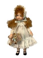 (image for) Little Lucy with her teddy bear