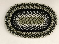 Oval Rug in Black, white and sage
