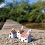 (image for) Set of three tiny houses with smoke coming out of chimney