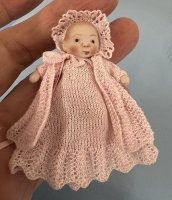 (image for) Porcelain Baby in pink crochet dress, coat, and bonnet