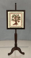 (image for) Fire Screen with cross stitched tree