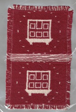 Red and White Woven Blanket with House