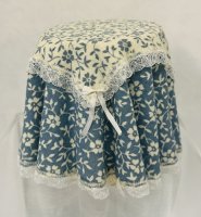 (image for) Blue and white cloth covered table with silk ribbon and lace trim