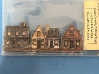 (image for) Set of four row houses on a wood backing