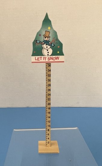 Let it snow on a measuring stick to measure snow - Click Image to Close