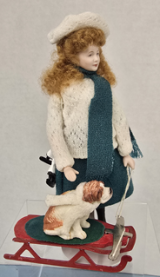 Artisan Made Doll in Cream Coat with Skates and Dog on Sled (image for) Artisan Made Doll in Cream Coat with Skates and Dog on Sled