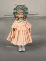 (image for) Porcelain doll in crepe paper dress