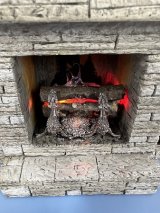 Outdoor Fireplace with Burning Embers and Flame Logs