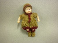 Baby in Knitted Costume