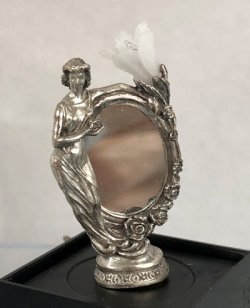 Silver mirror with lady figure and light