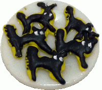 Black Cat Cookies on a Saucer