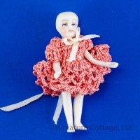 (image for) Tiny Porcelain Toddler Doll in Crochet Dress