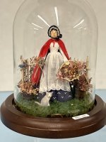 (image for) 1.24th Woman in Red Cape in a Glass Dome