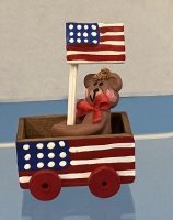 (image for) Fourth of July Wagon with bear and flag