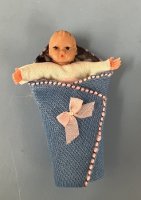 (image for) Vintage Baby in a blanket with arms open