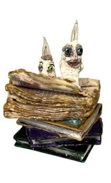 Stack of Books with Candles with Faces and That Light Up (image for) Stack of Books with Candles with Faces and That Light Up