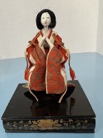 (image for) Oriental Doll Sitting on Box