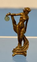 Nude holding Jade ball in bronze by Jim Pounder