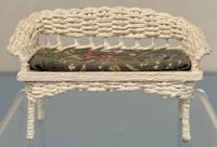 (image for) White Wicker Couch with Floral Cushion