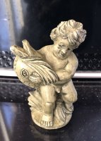 (image for) Statue by Falcon of Boy holding fish