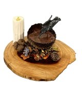 Lighted Tall Candle with Crow Drinking Water on Cedar Table (image for) Lighted Tall Candle with Crow Drinking Water on Cedar Table