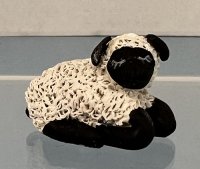 (image for) Black Faced Sheep Lying Down