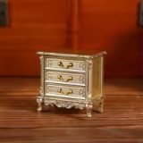 (image for) Gold Bedside Table with three opening drawers