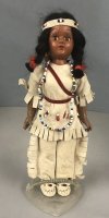 8" Indian Girl with bead work and bow/arrow holder