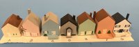 (image for) 7 Tiny Wooden Houses to Put on a Shelf