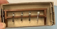 (image for) Utensil Rack with Four Silver Spoons