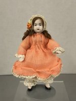 Dollhouse Girl in Peach Dress