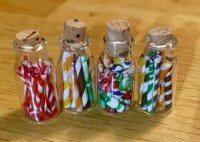 (image for) Four Glass Jars of Candy