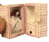 (image for) Tiny Doll in Trunk