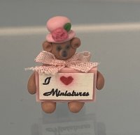 (image for) Brown Bear in Pink Hat Holding "I love Miniatures" Sign