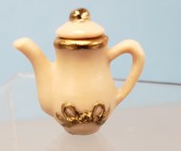 Cream and Gold Colored Teapot