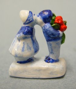 Kissing Blue and White Figures