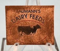 Tin Sign Baumanns Dairy Feeds