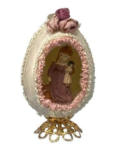 (image for) Panoramic Easter Egg on Stand with Girl Holding her Doll